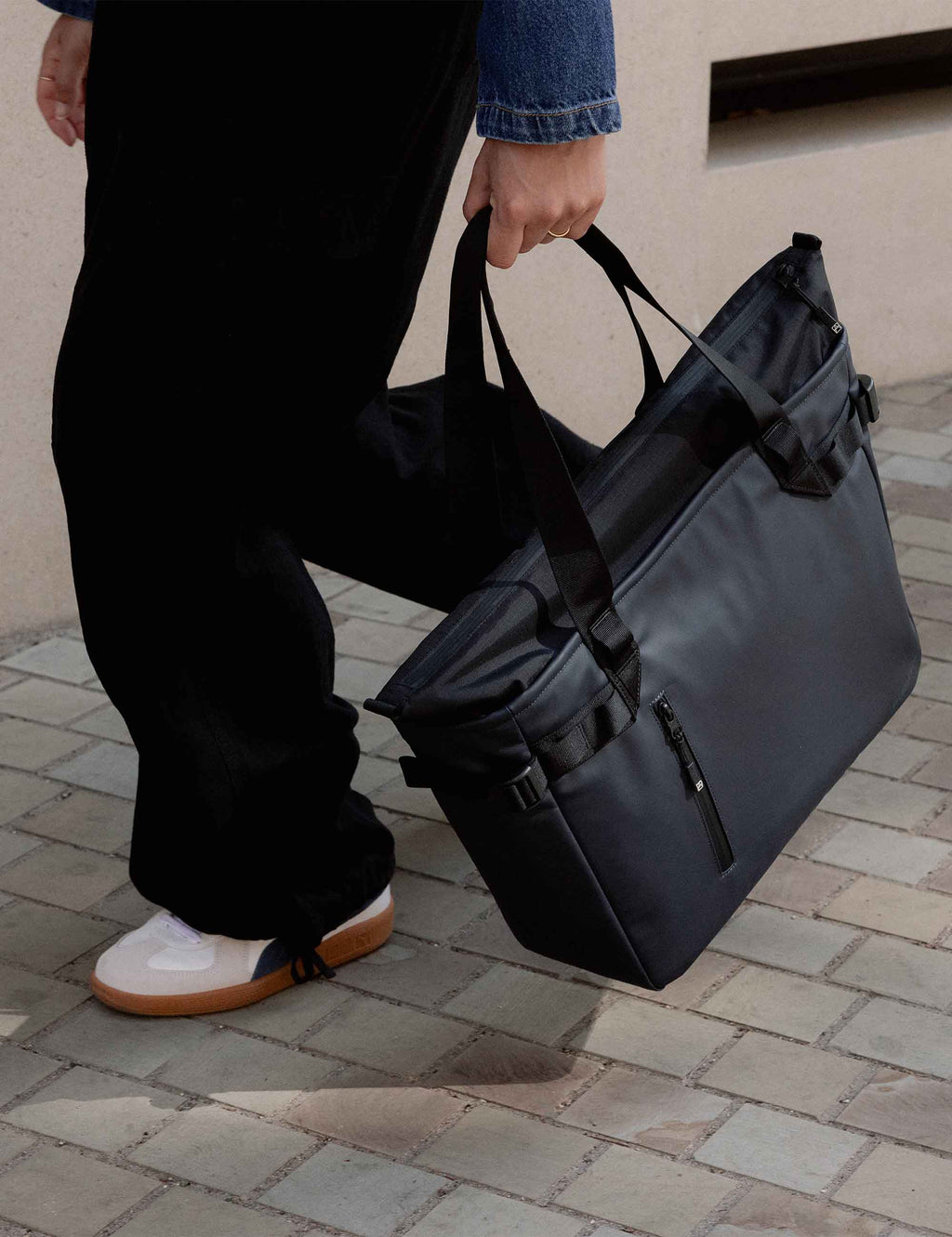 Midnight blue laptop tote bag with shoulder strap and side zipper pocket