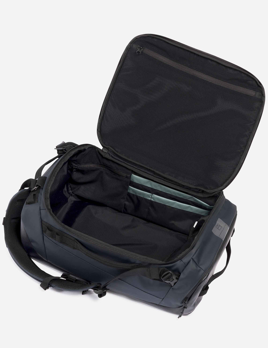 Dark duffel bag open with internal mesh pocket, zip closure, and carry handle