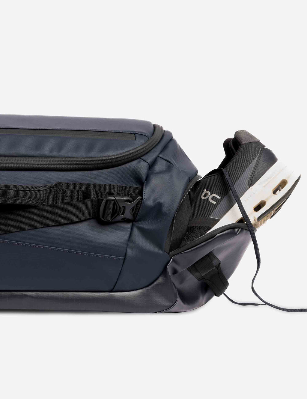 Midnight blue duffel bag with front zip pocket and cable pass-through