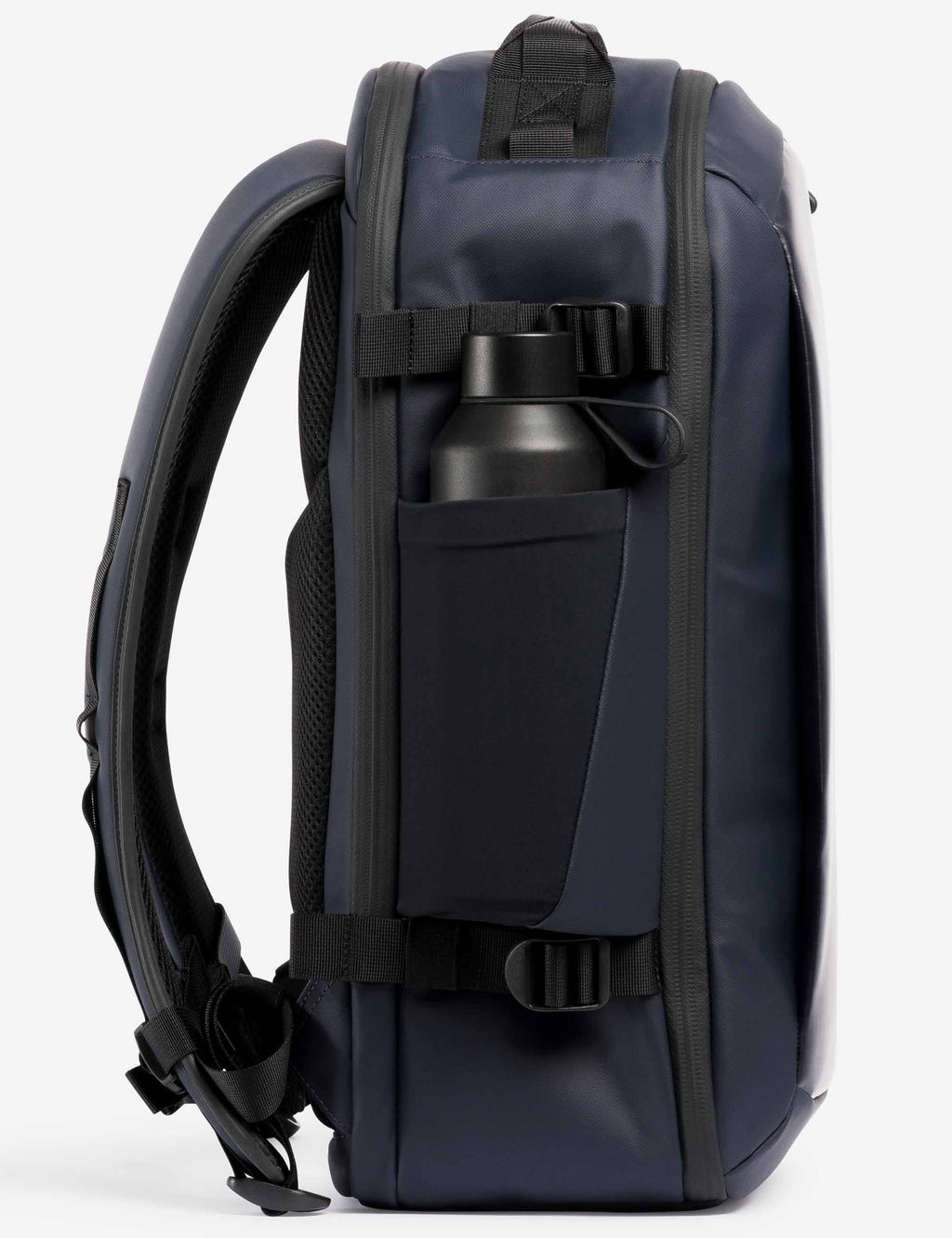 Midnight blue hybrid backpack side view with front utility pocket and straps