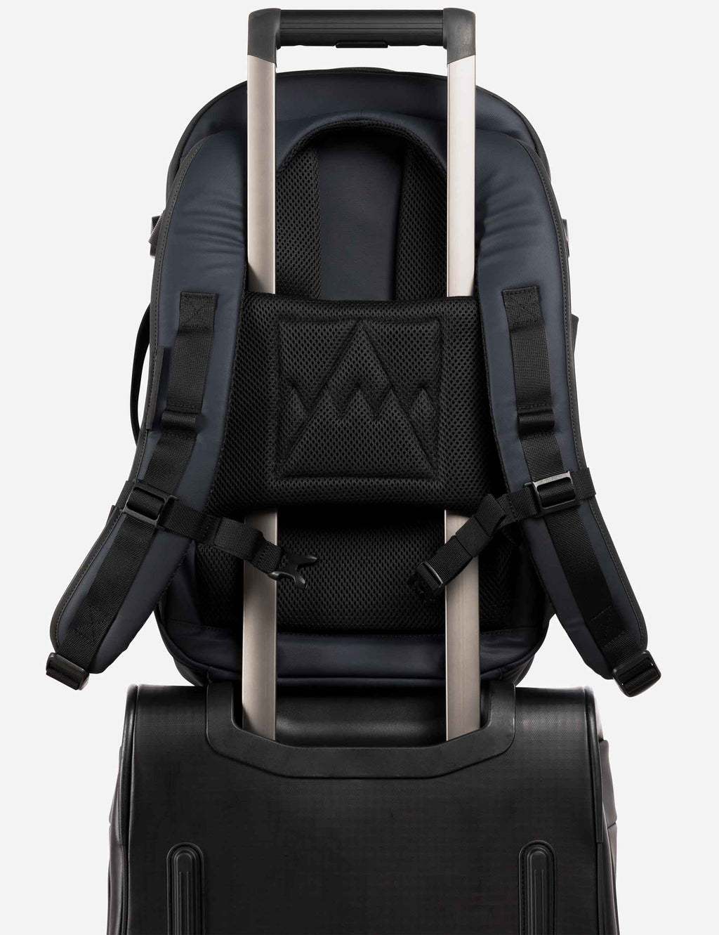 Midnight blue hybrid backpack with rear trolley strap and padded shoulder harness