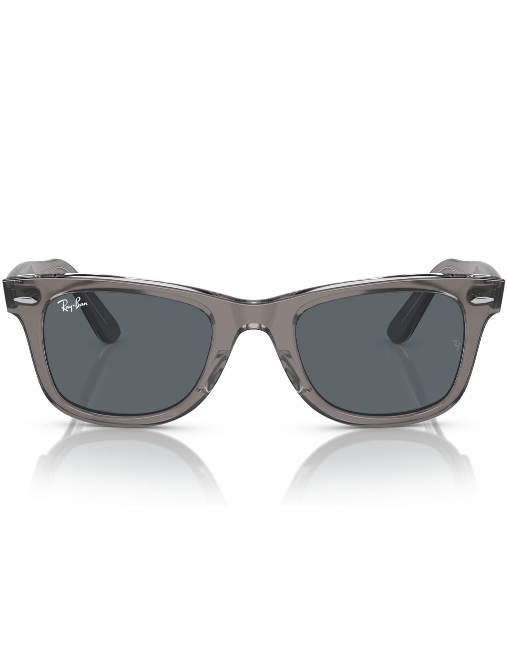 Wayfarer-style sunglasses with blue lenses and translucent gray frame, angled front