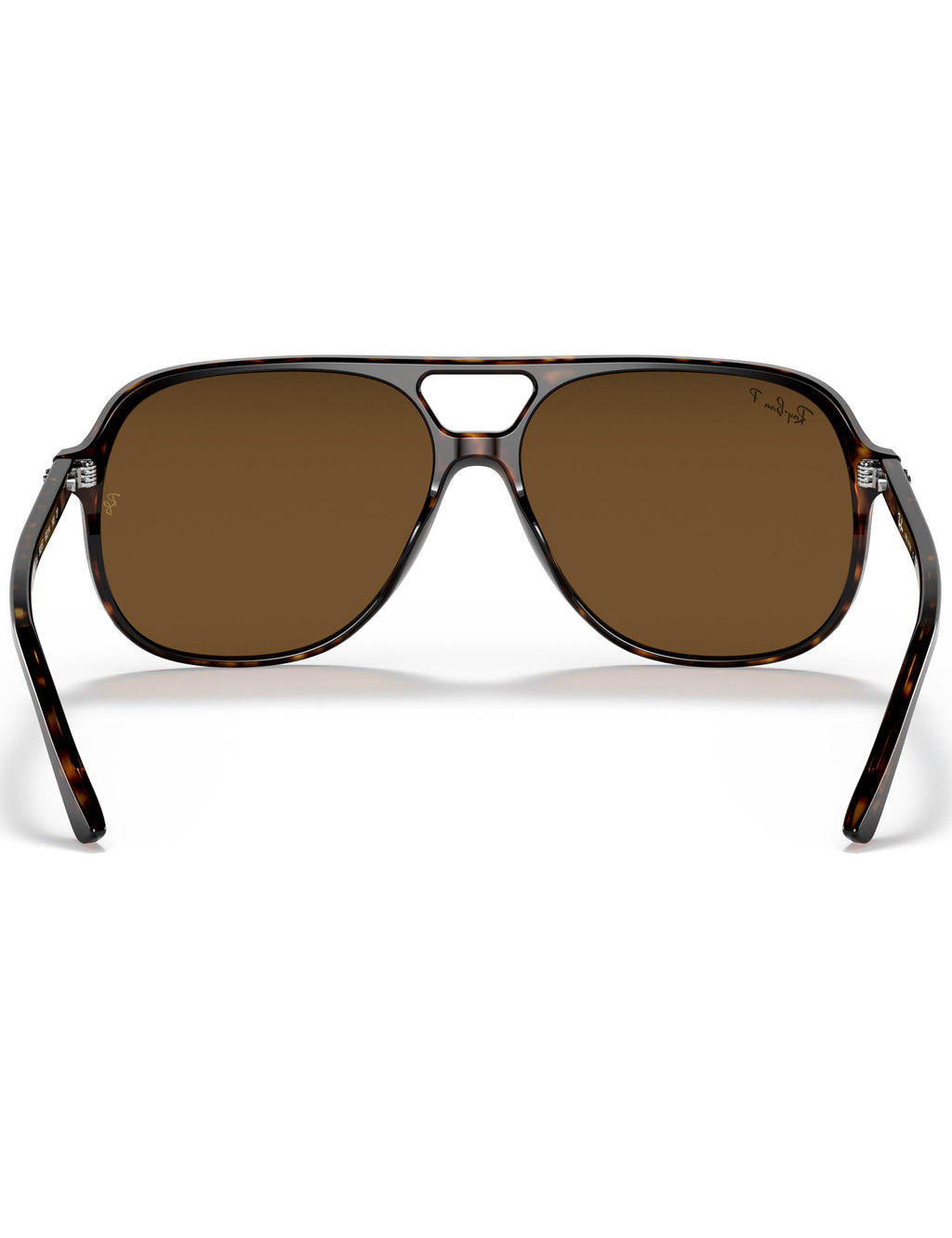 Aviator sunglasses with brown lenses on a white background