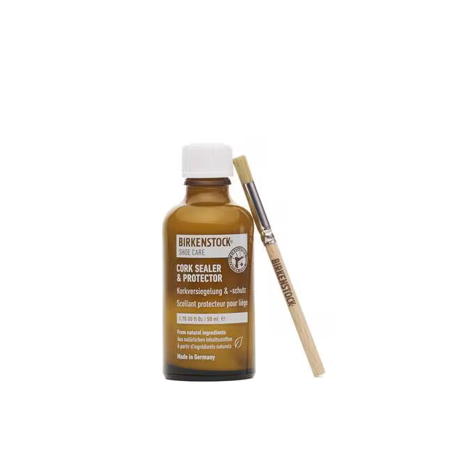 Birkenstock Cork sealer and protector bottle with included brush, amber brown liquid