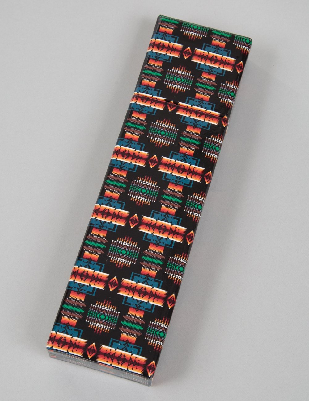 Printed pencil roll case with colorful geometric pattern and stitched edge, black base