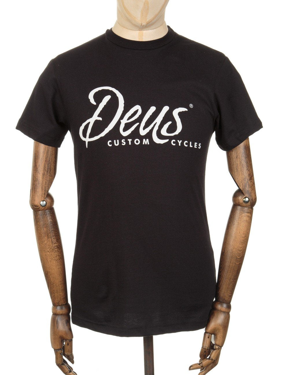 Black short-sleeve t-shirt with white Deus Custom Cycles logo on chest