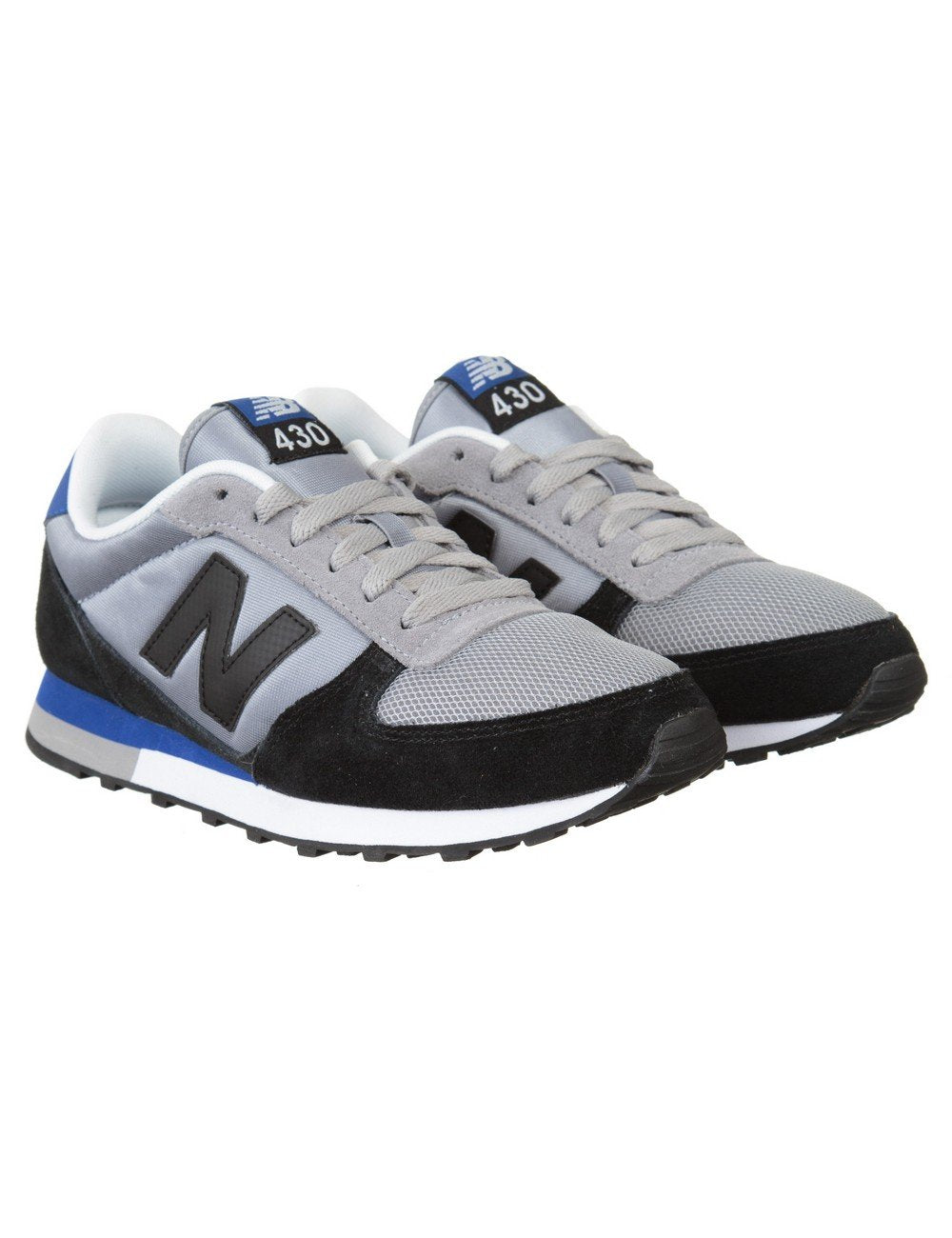 Trainers in grey and black with blue trim, lace-up front and large N logo