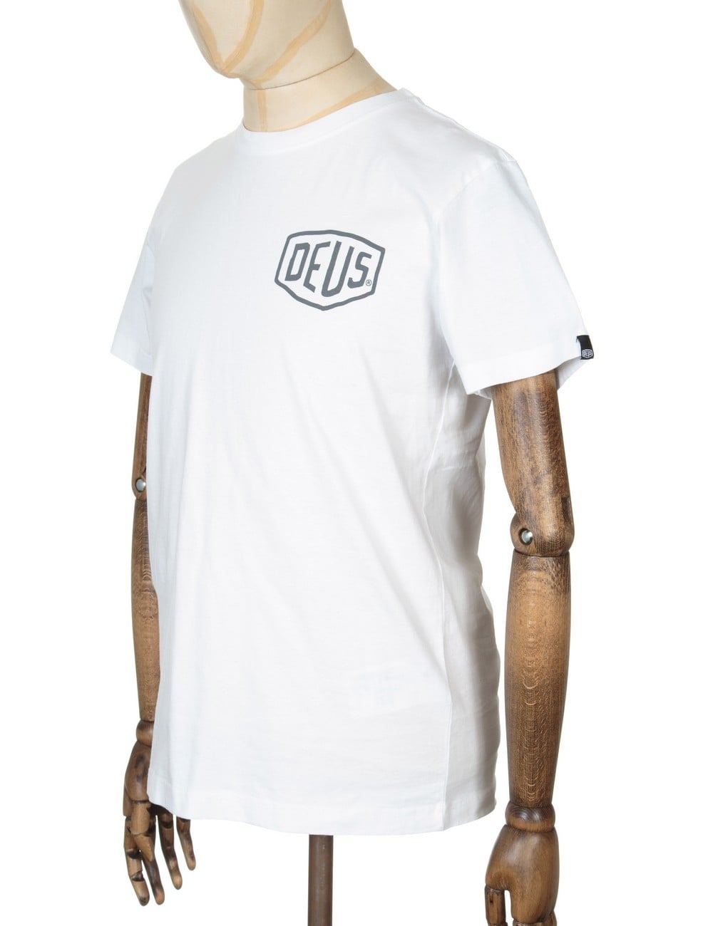 White t-shirt with small Deus logo on back