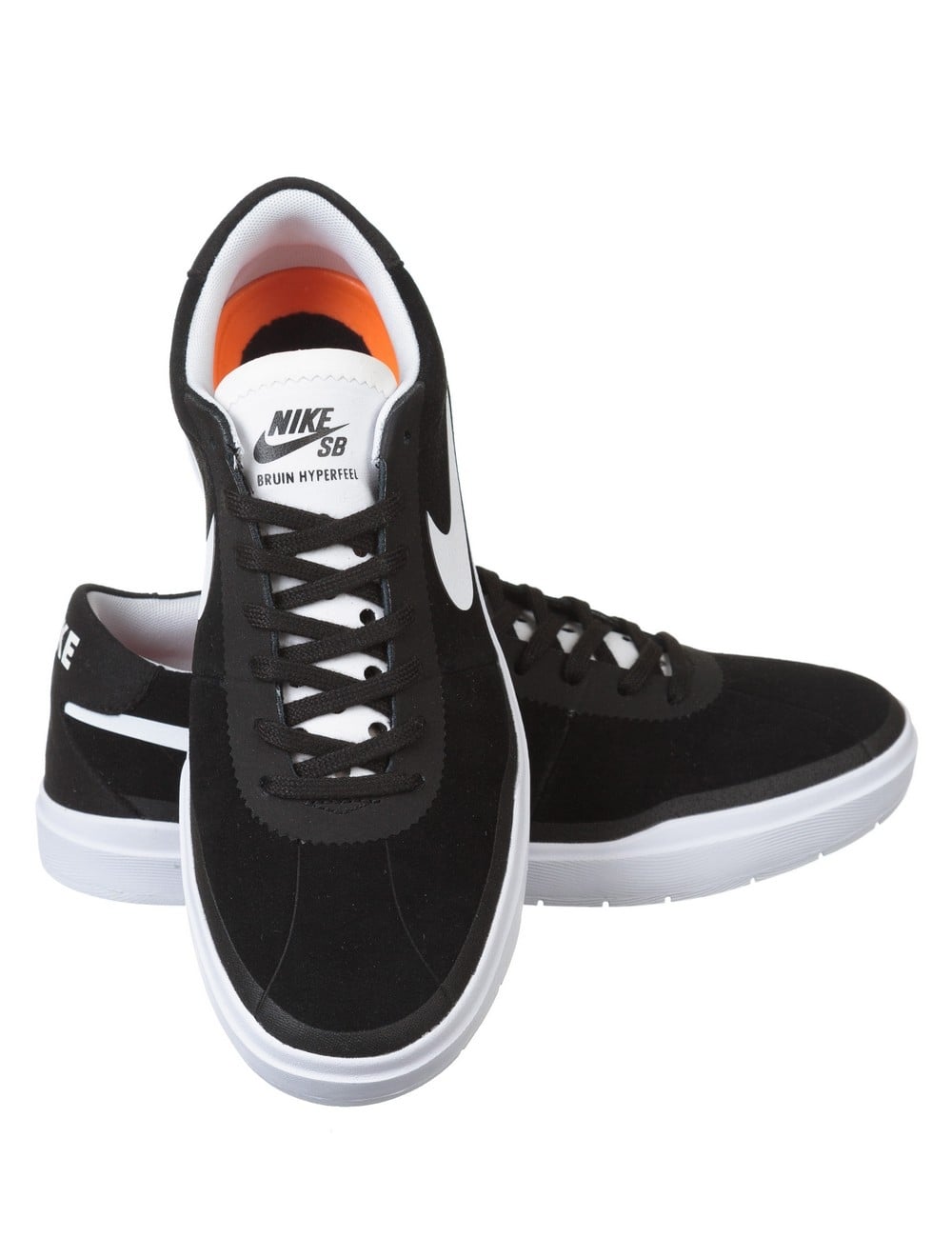 Nike black trainers with white swoosh; orange lining visible at collar