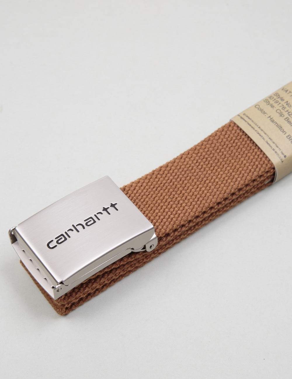 Carhartt clip belt buckle over woven brown strap, chrome metal with rivets