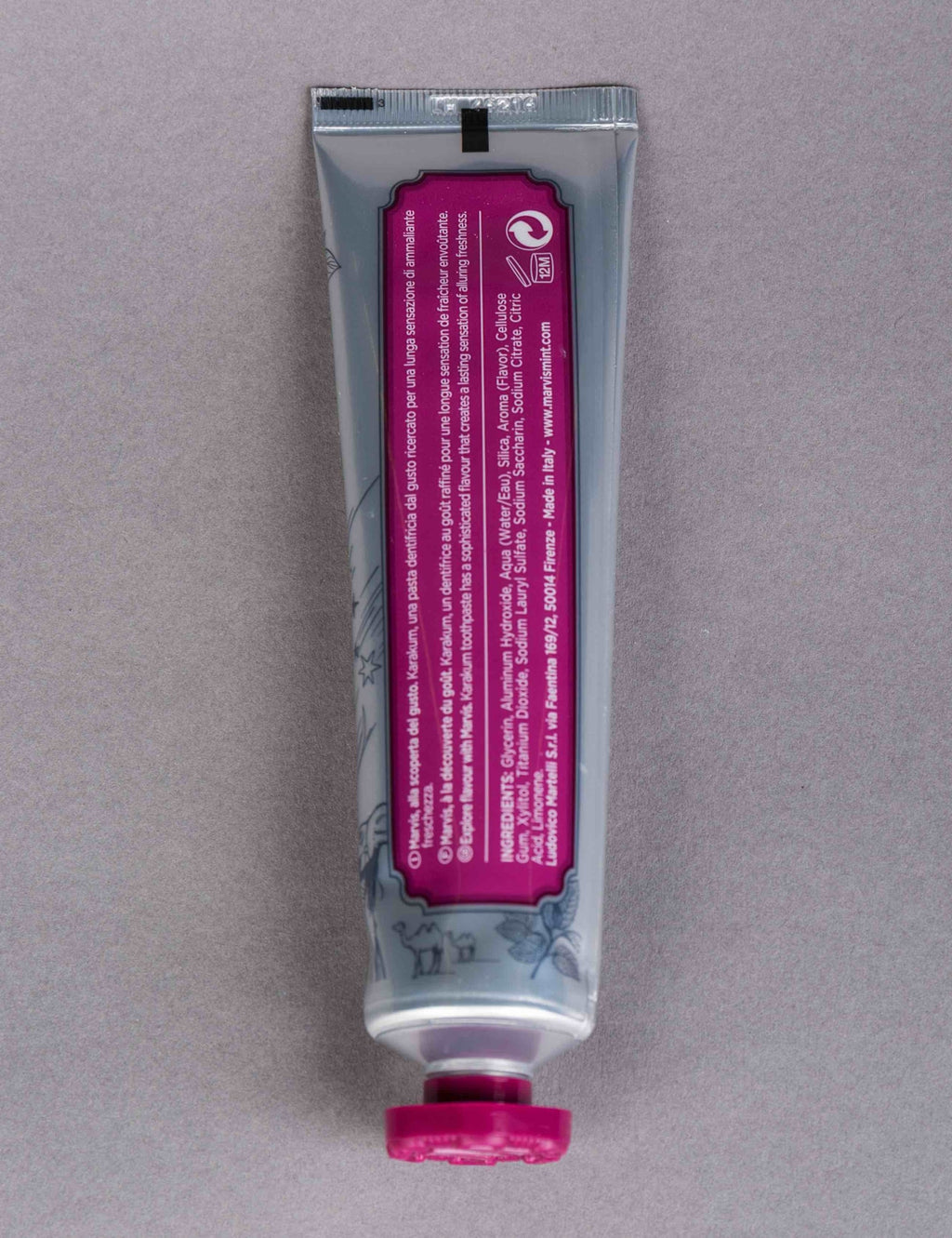 Marvis Karakum toothpaste tube, back label text visible and purple cap
