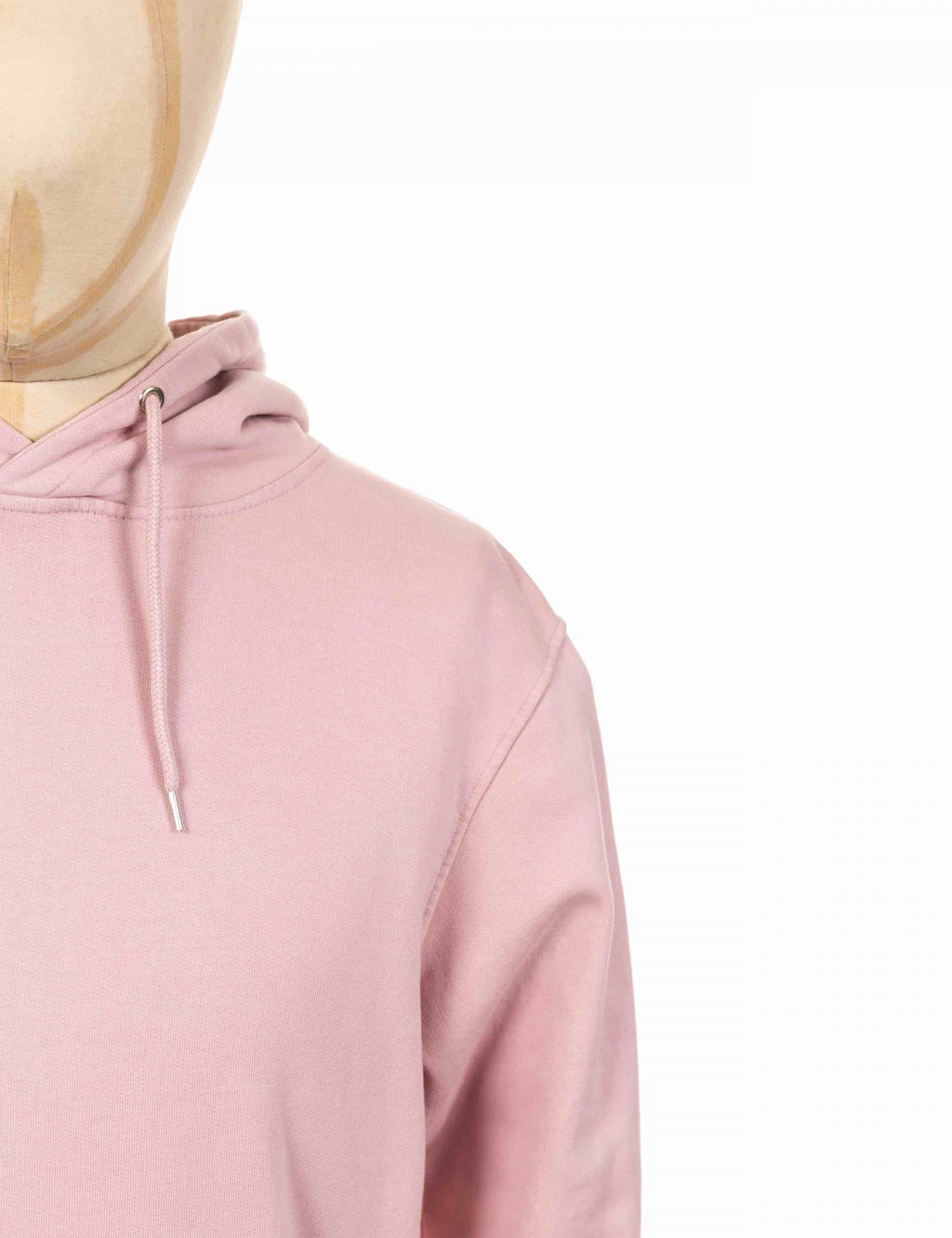 Faded pink hoodie close-up of hood and drawstring neckline