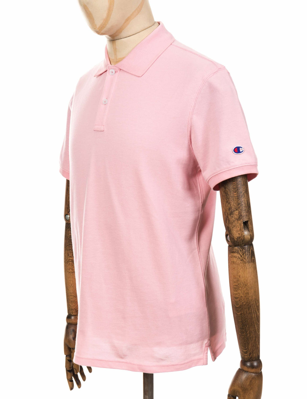 Pink polo shirt front with collar, button placket, and sleeve logo