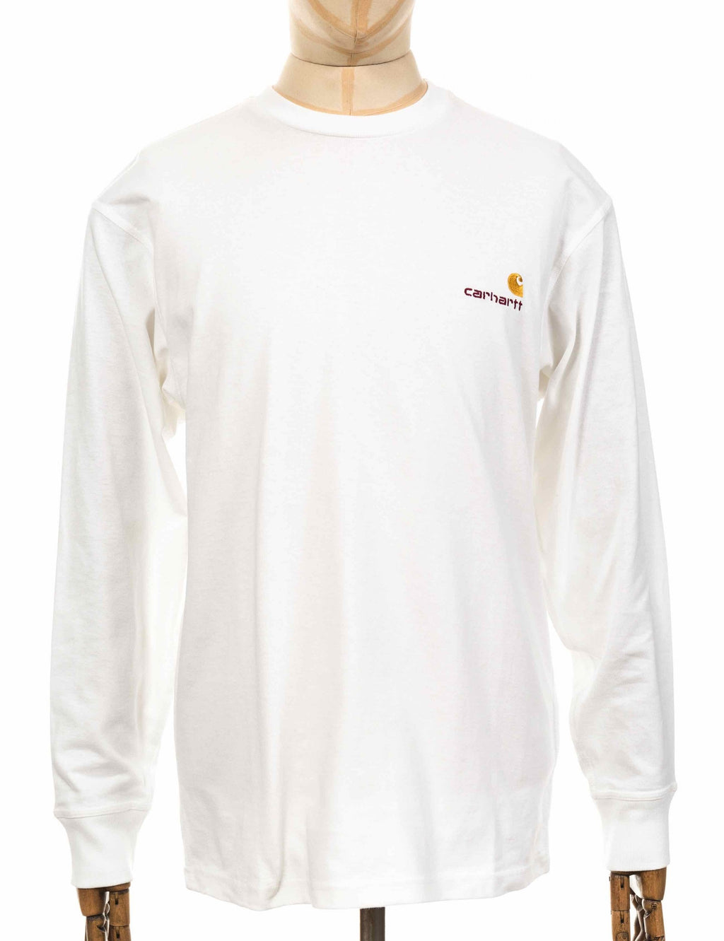 White long-sleeve T-shirt on model with small chest Carhartt logo