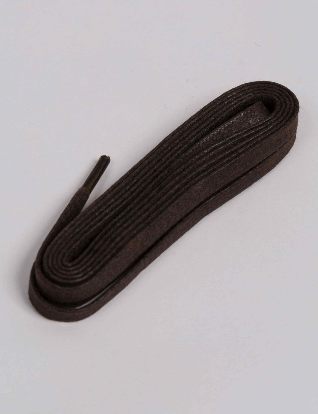 Brown flat waxed boot laces, 48 in, coiled with one lace end