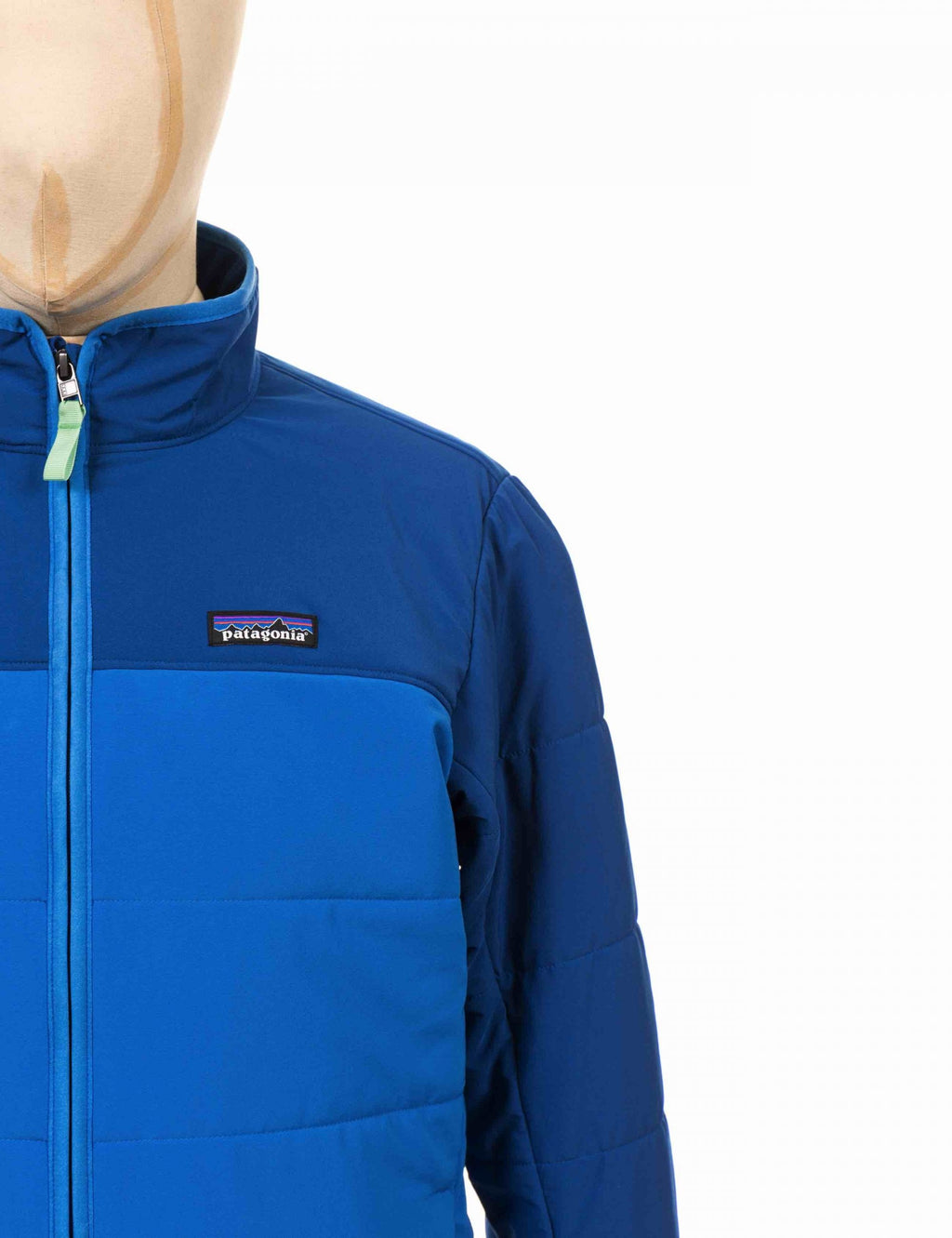 Blue packable puffer jacket with full-zip, stand collar, and chest logo patch