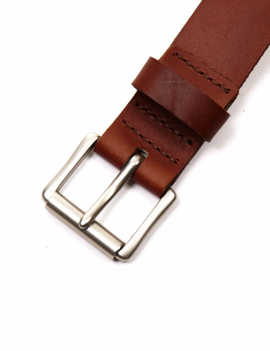 Heritage belt buckle detail with stitched dark brown leather strap