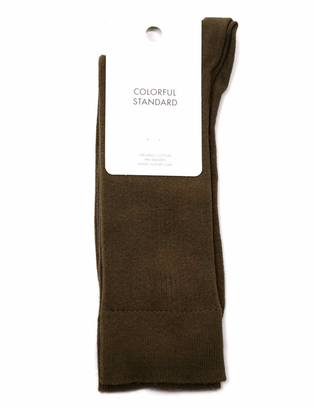 Dusty olive crew socks with Colorful Standard tag, ribbed cuffs and knit texture