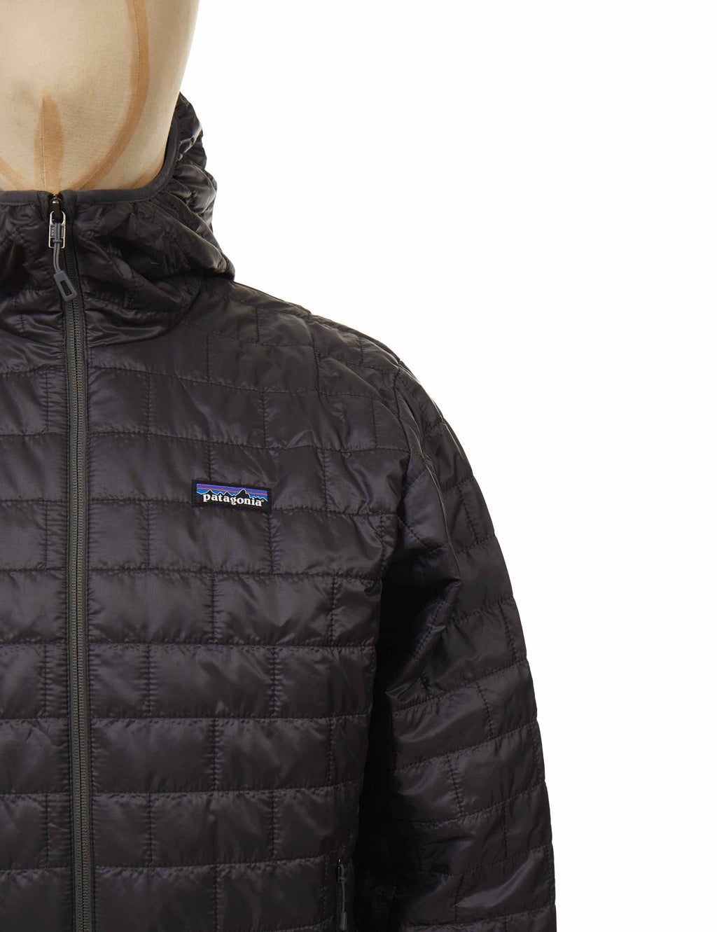 Nano Puff hooded jacket in dark gray, chest logo patch and front zipper