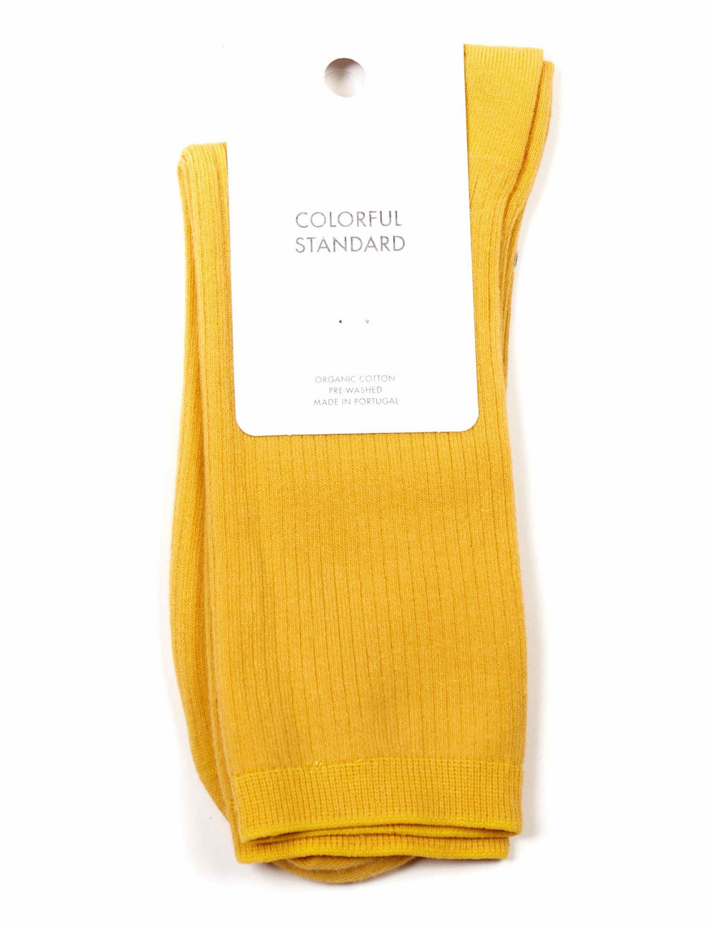 Burned yellow crew sock with ribbed cuff, folded flat, single pair view