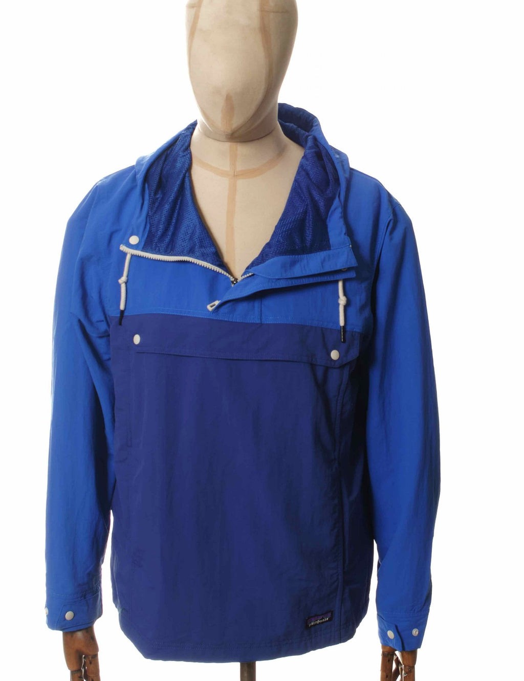 Blue pullover anorak with hood, half-zip front, snap button placket