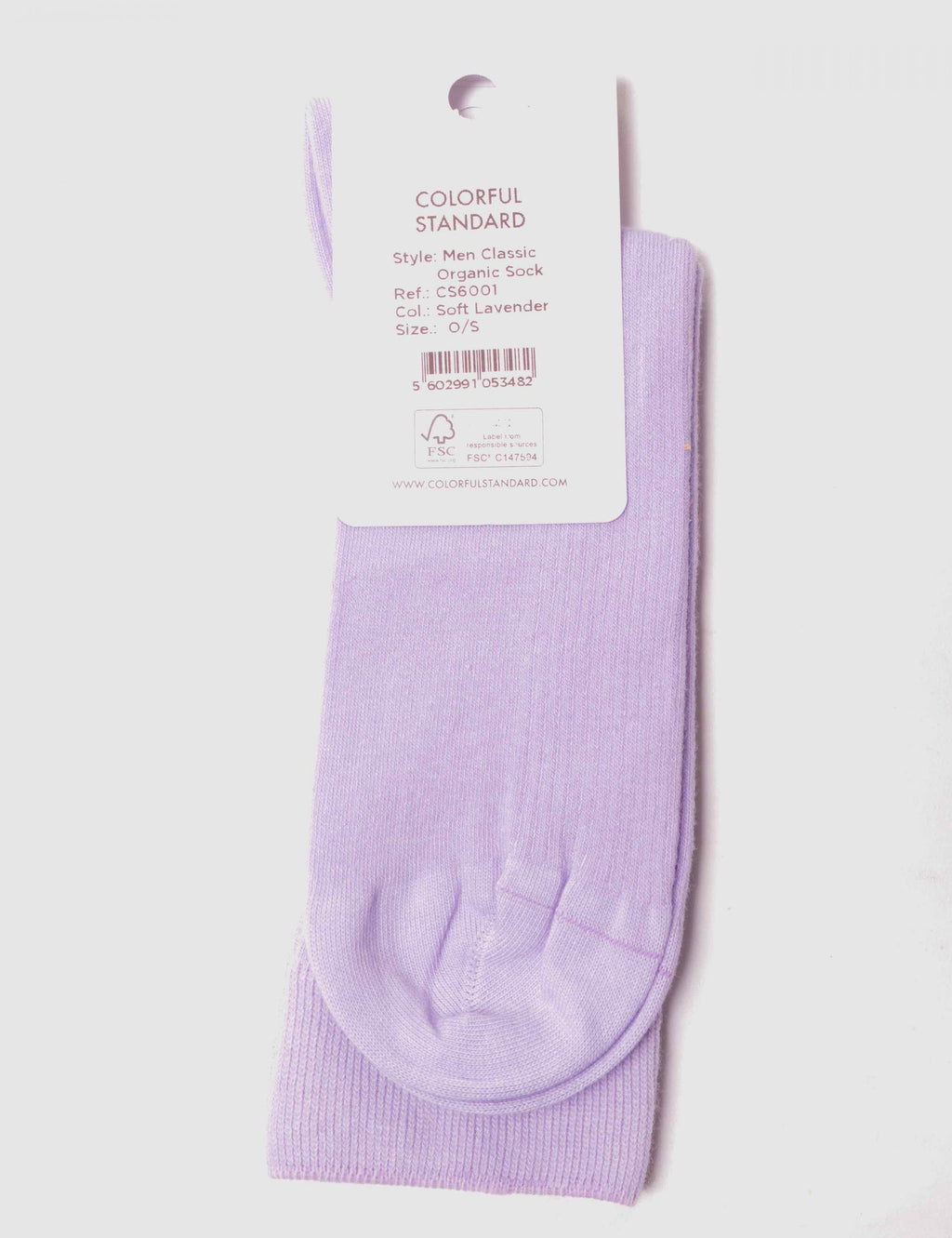 Lavender crew sock detail with ribbed knit texture and toe seam, label attached