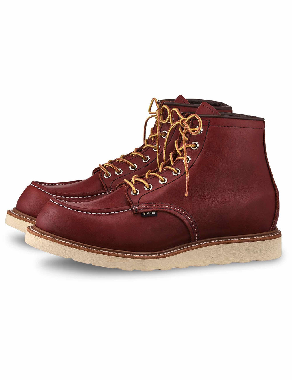 6-inch moc-toe lace-up boot in dark russet leather, side profile with tan outsole