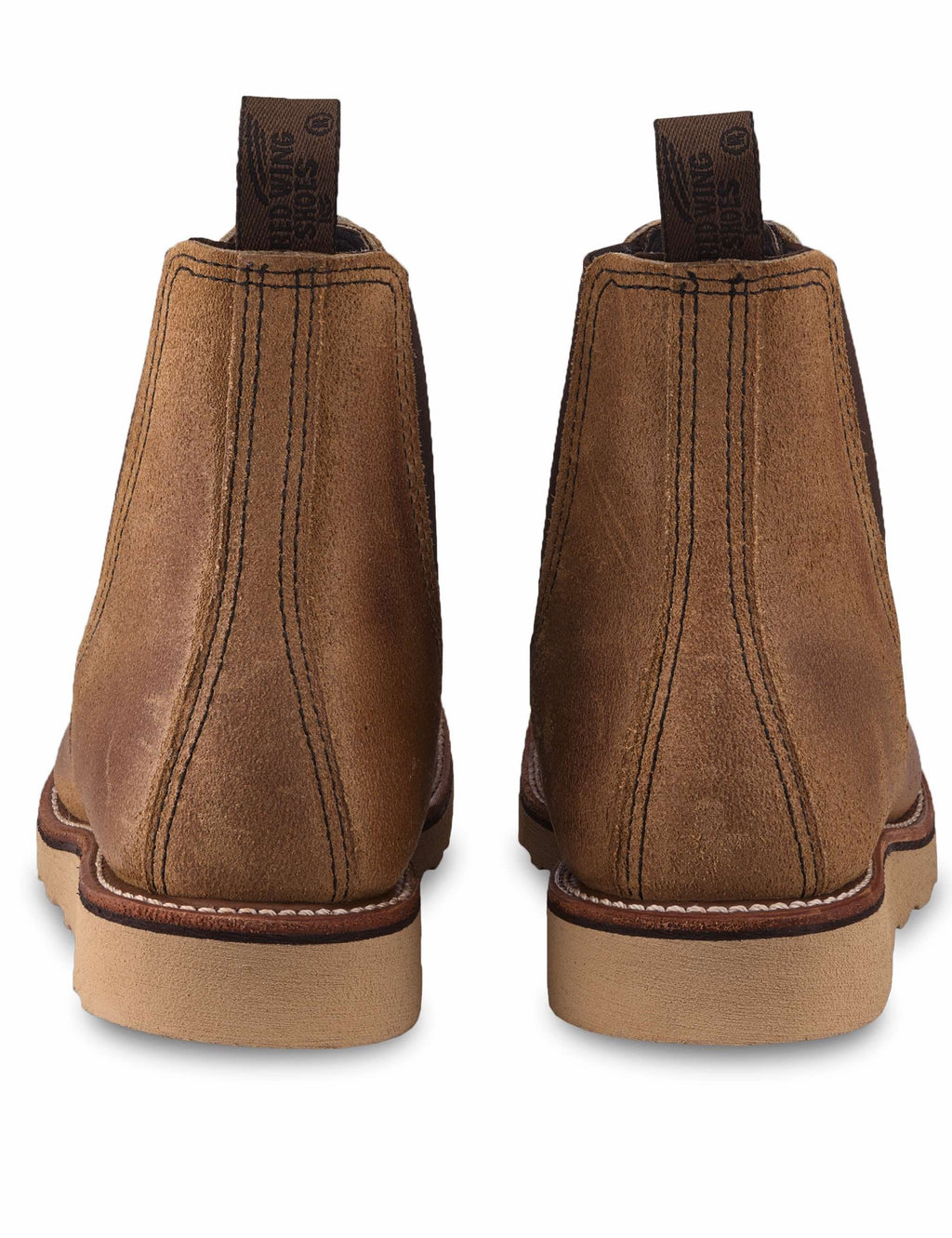 Tan muleskinner Chelsea boots pair, angled rear view with pull tabs and heel