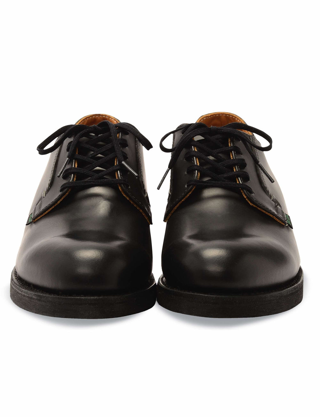 Black leather oxford work shoes, rear view with lace-up ties and rubber sole.