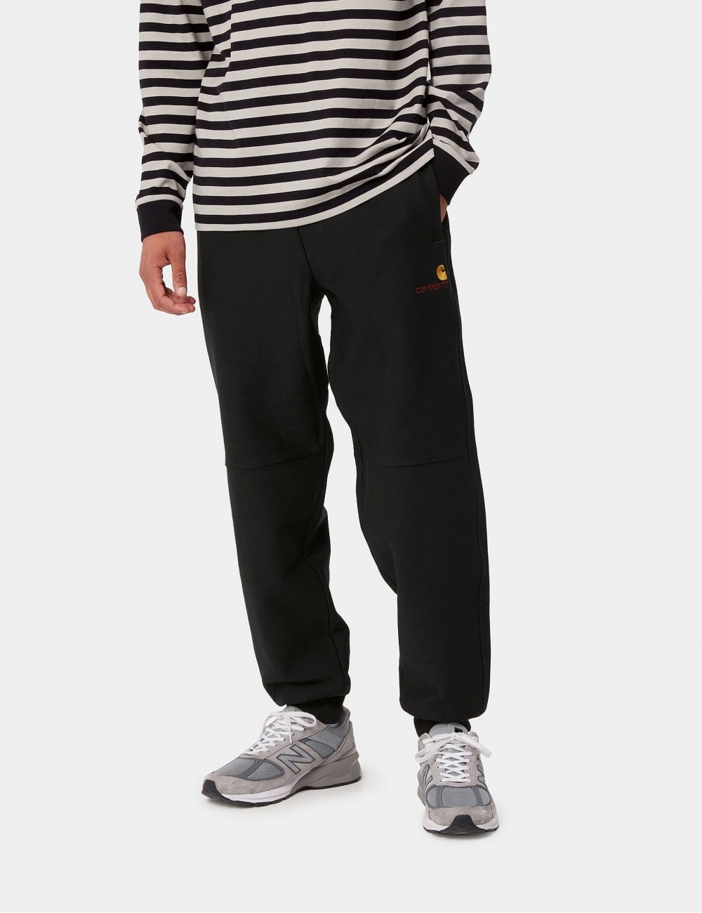 Black jogger pants with side pockets, ribbed cuffs and embroidered logo