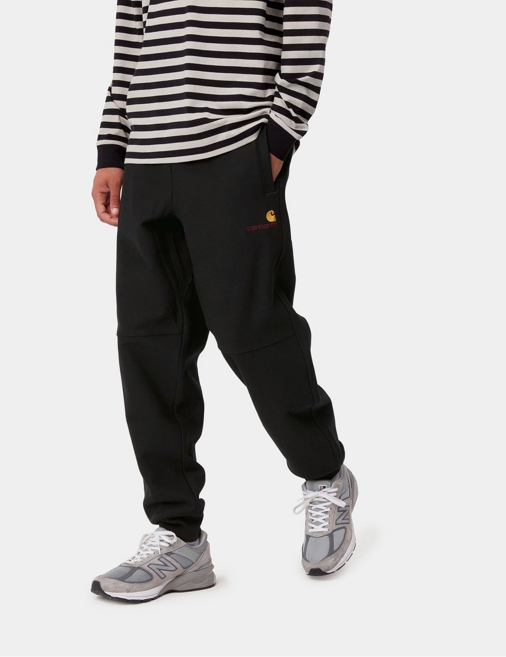 Black jogger pants with side pocket and embroidered logo detail