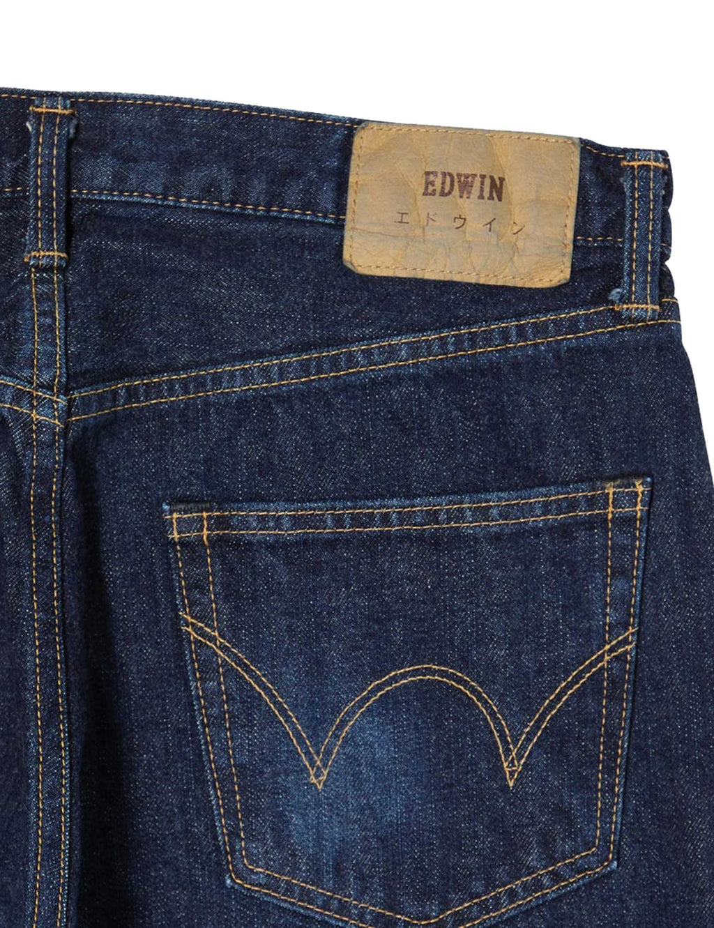 Men's dark blue jeans back waist patch and large V-shaped back pocket stitching