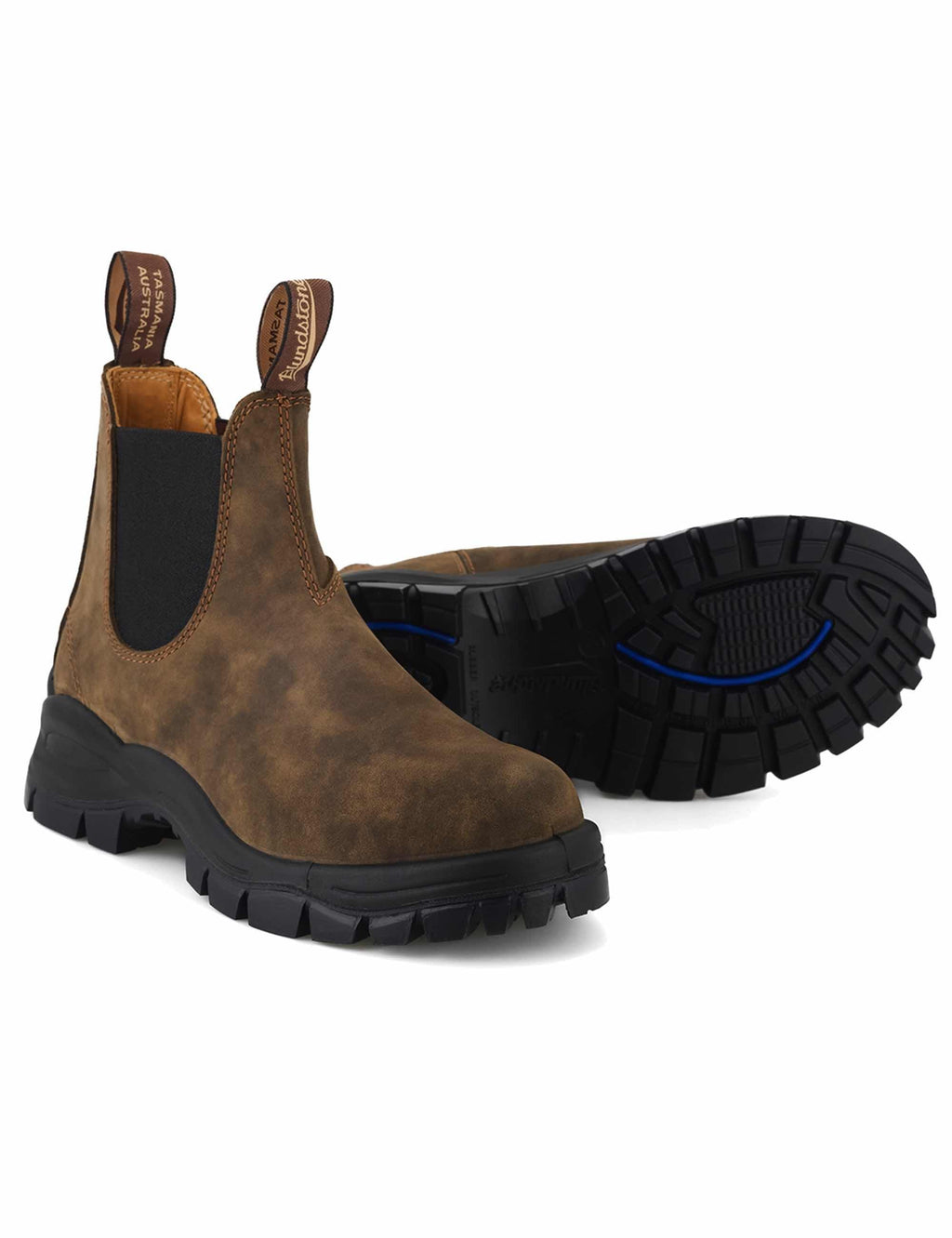 Rustic brown Chelsea boots with elastic gore and chunky black lug sole, side view