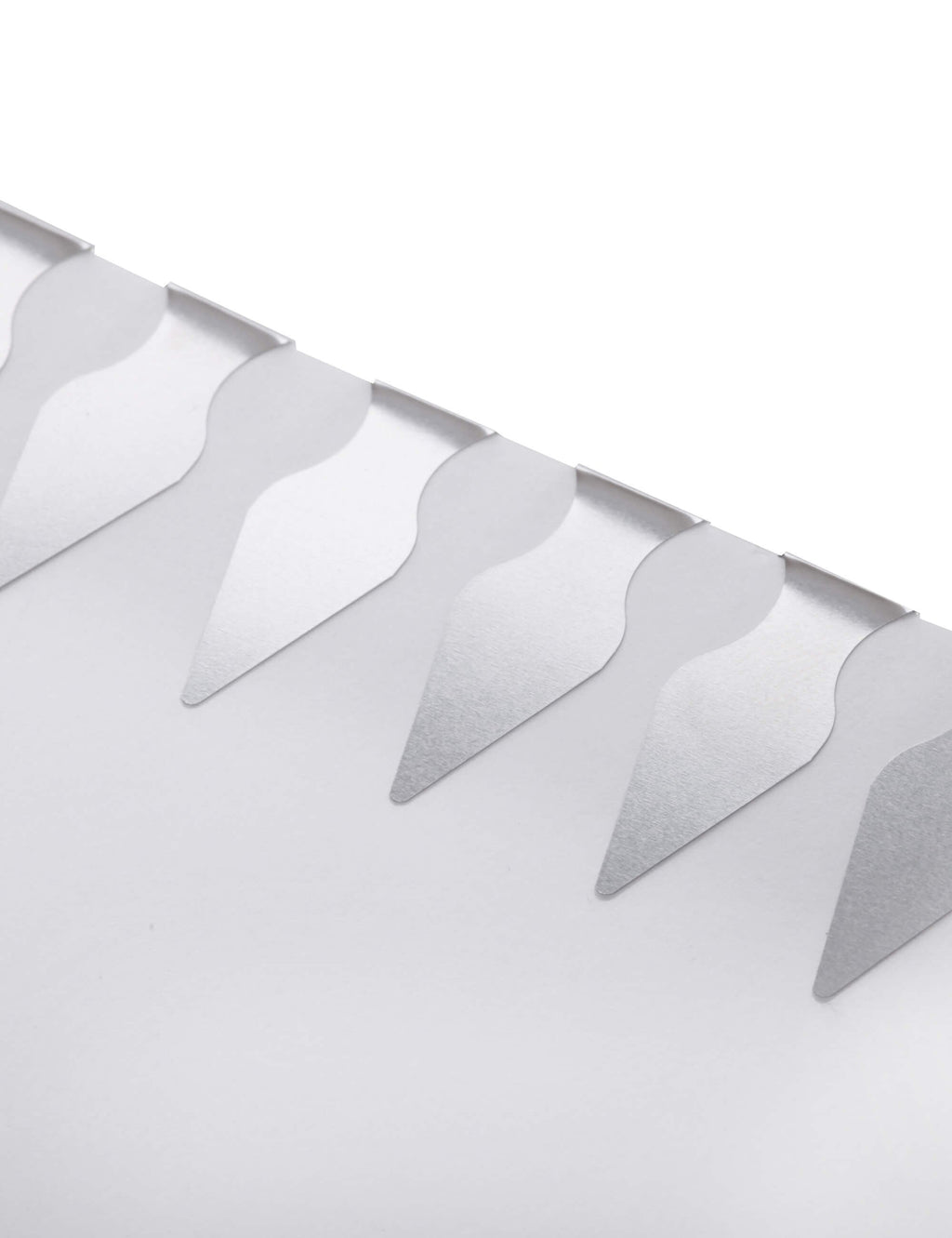 Row of white and silver dart-shaped notes with pointed tips