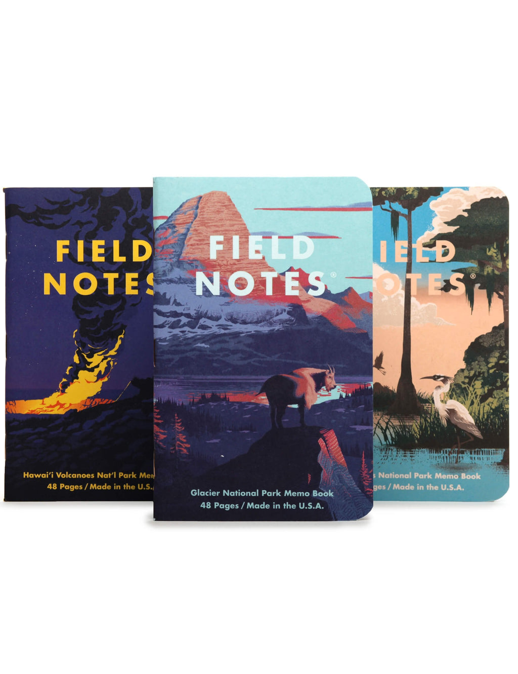Set of three Field Notes series F memo notebooks, blue, yellow, and orange landscape covers