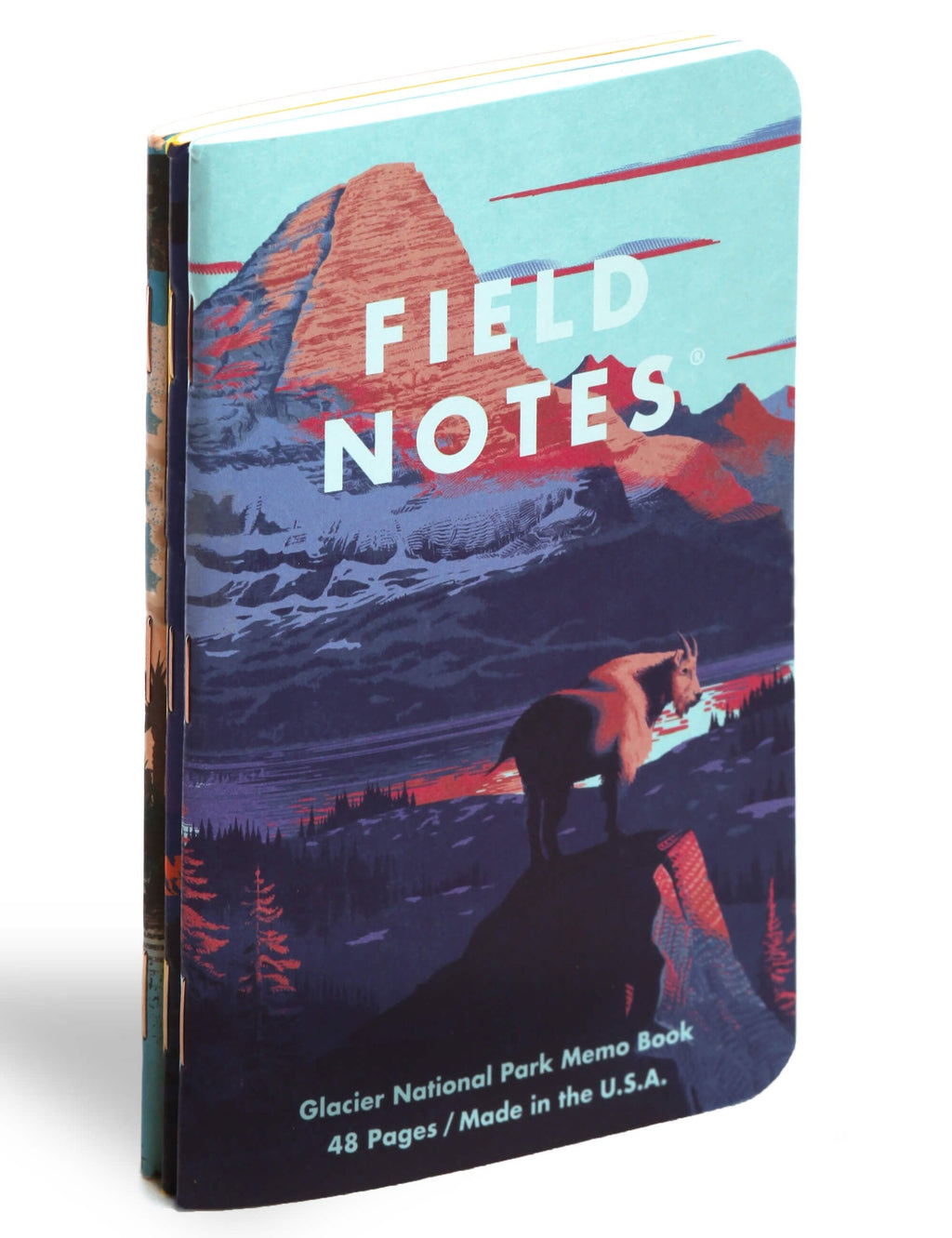 Field Notes series F memo notebook, side view, blue cover with mountain and wolf
