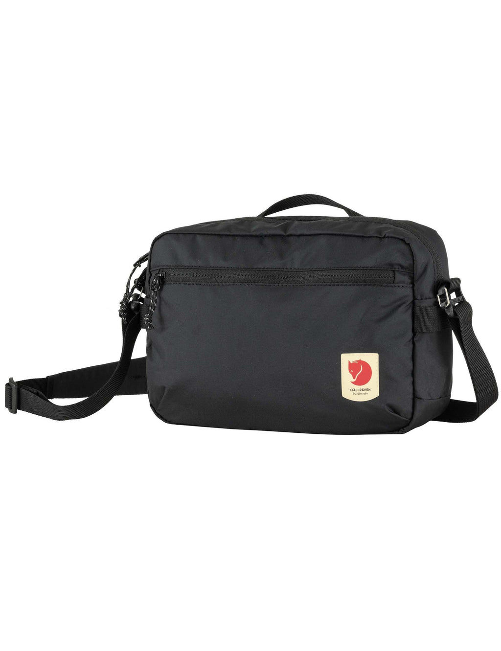 Black crossbody bag with side zip and front logo patch, adjustable strap