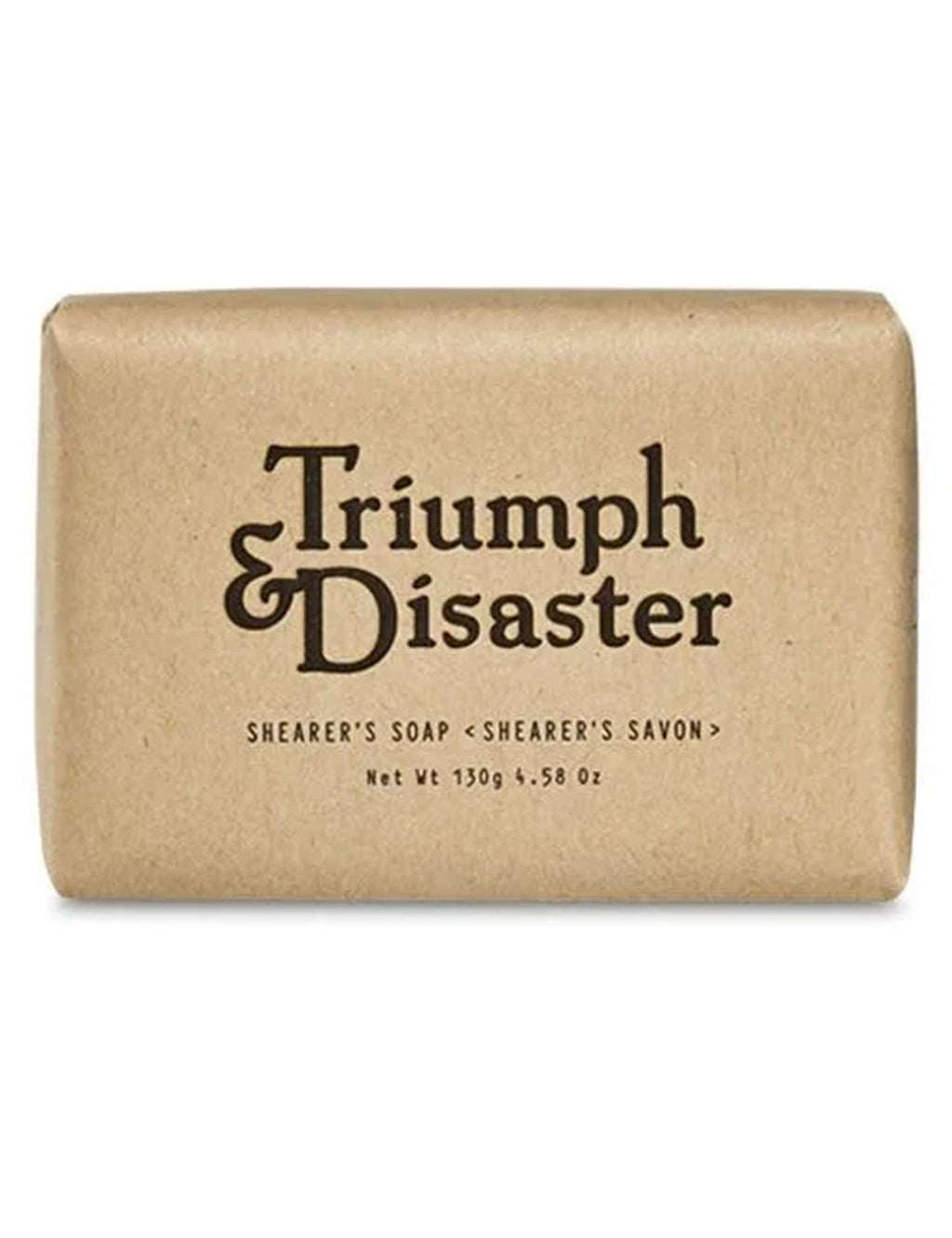 Beige soap bar with 'Triumph & Disaster' label