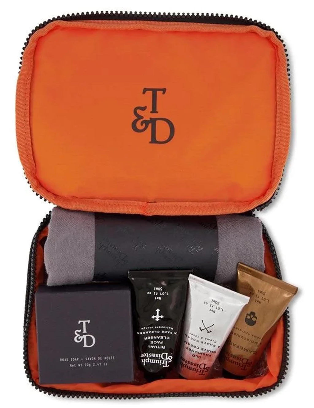 Travel kit zip pouch with orange lining and T&D logo; pouch shown open with toiletries inside