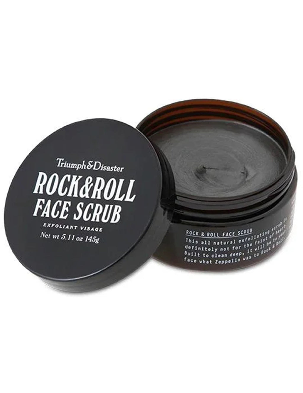 Open face scrub jar with gray cream inside and black screw lid on side.