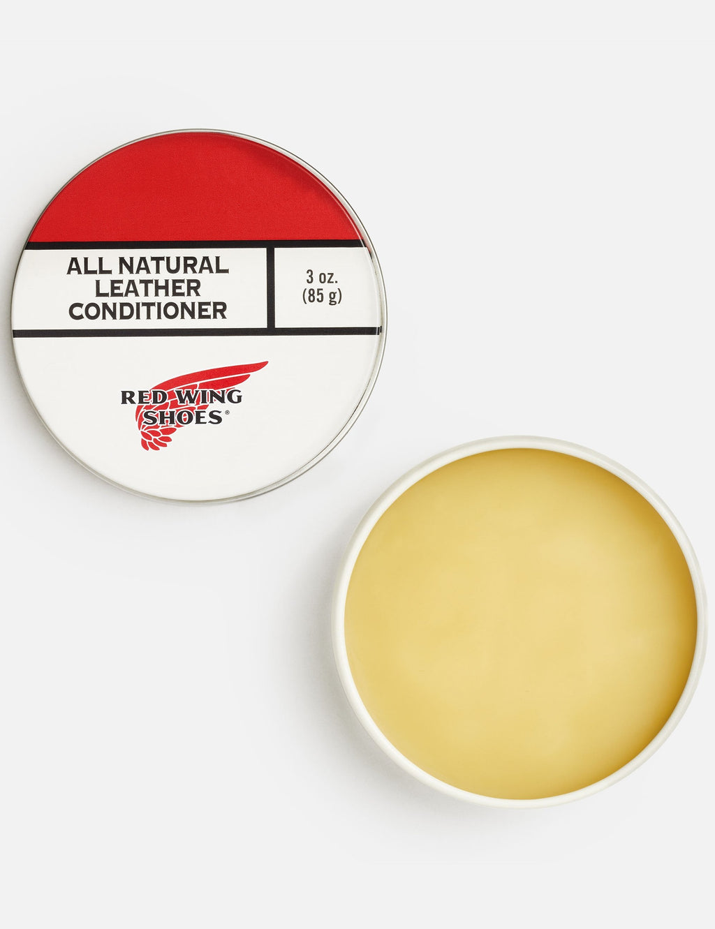 All natural leather conditioner tin with open lid, yellow cream and 3 oz label