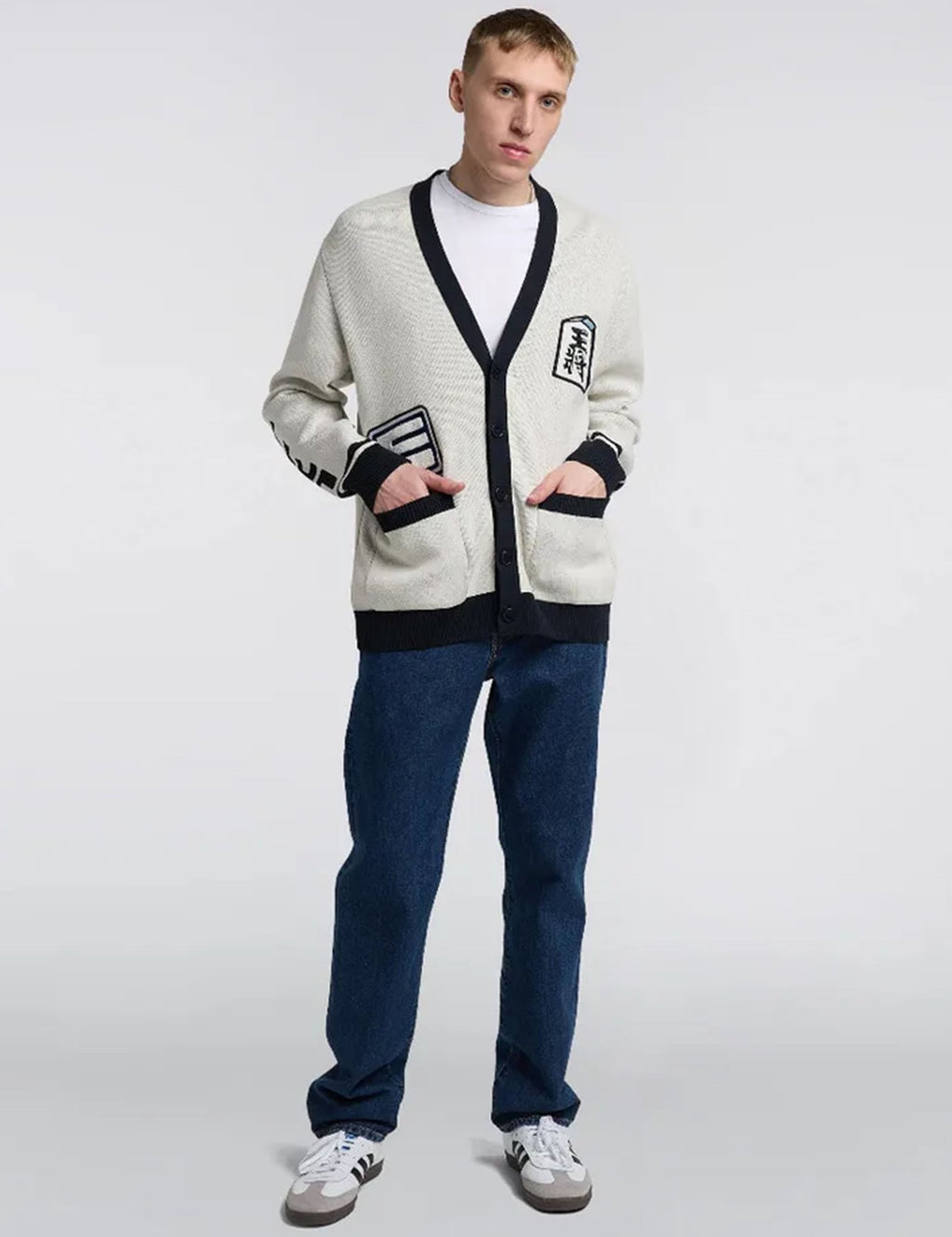 Blue loose straight jeans with belt loops, front pockets, and relaxed straight fit.