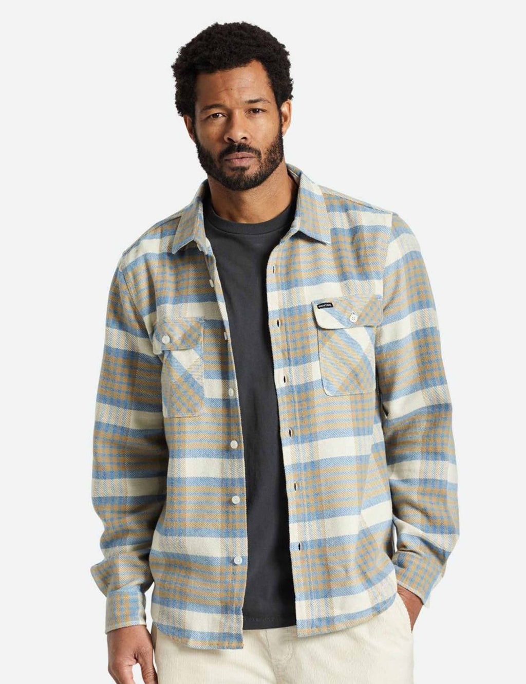 Men's plaid flannel button-up shirt in blue and sand with two chest flap pockets