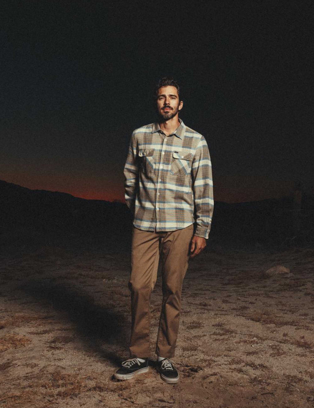 Plaid flannel button-up shirt in blue and sand with two chest flap pockets, casual fit