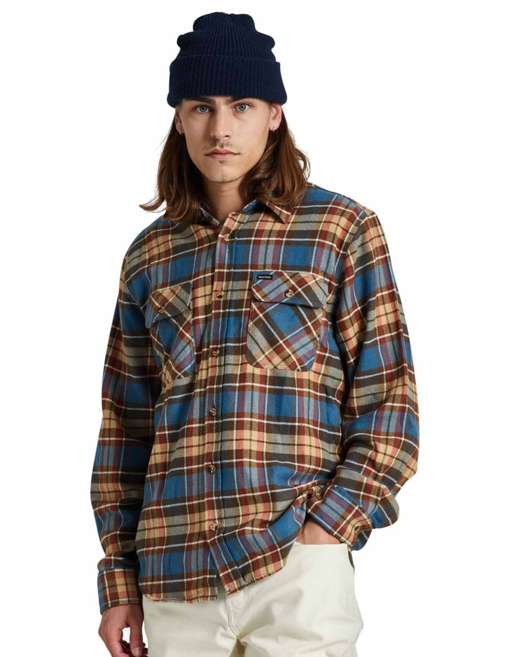 Plaid flannel shirt with long sleeves, button front, and chest flap pockets