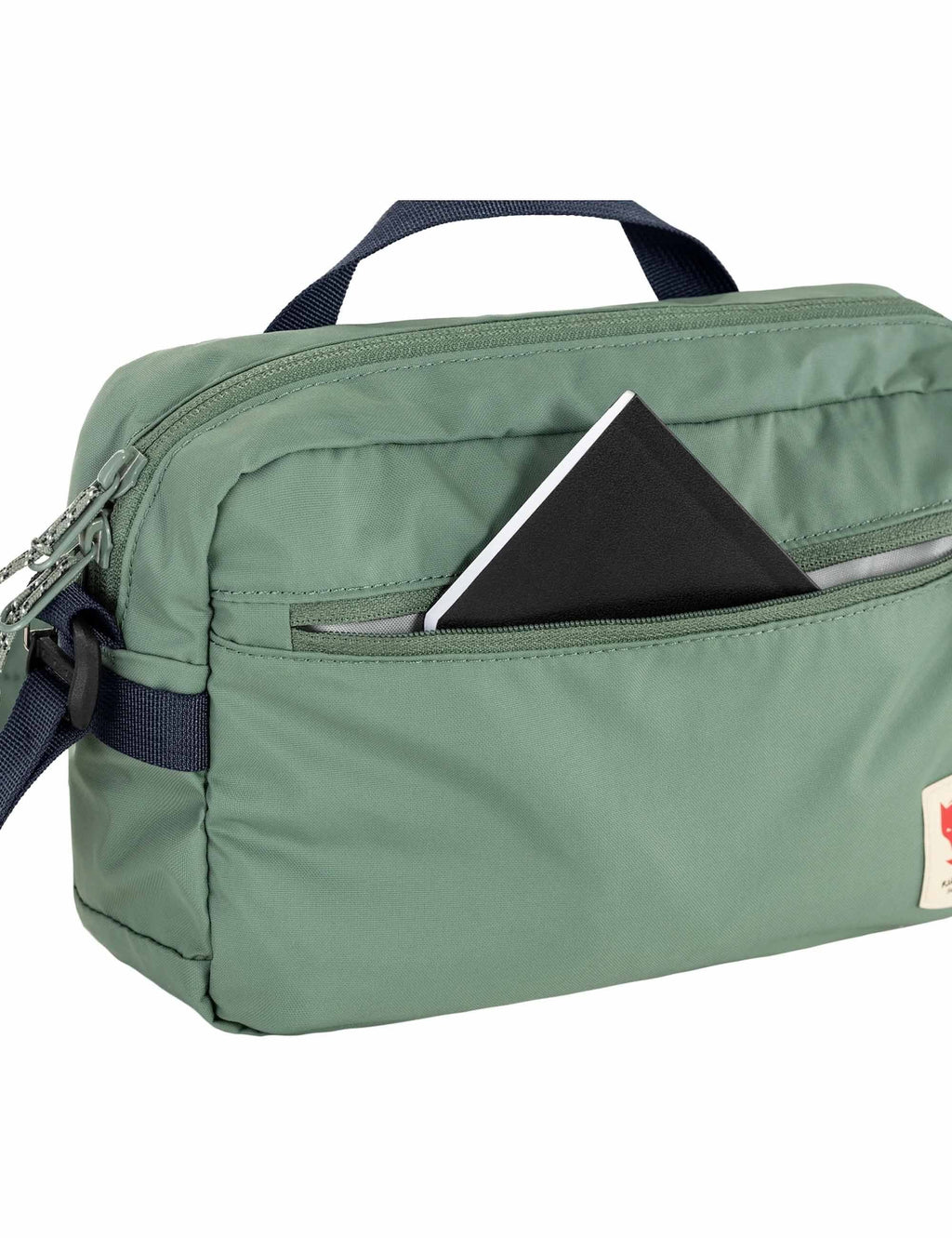 Patina green crossbody 3L bag with open front pocket and visible interior