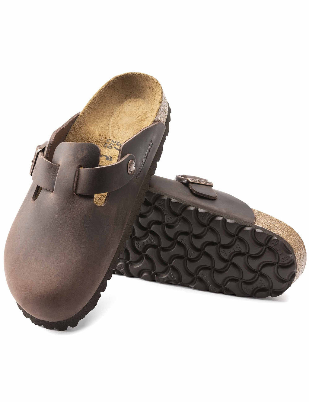Brown leather mule with buckle strap and patterned rubber outsole