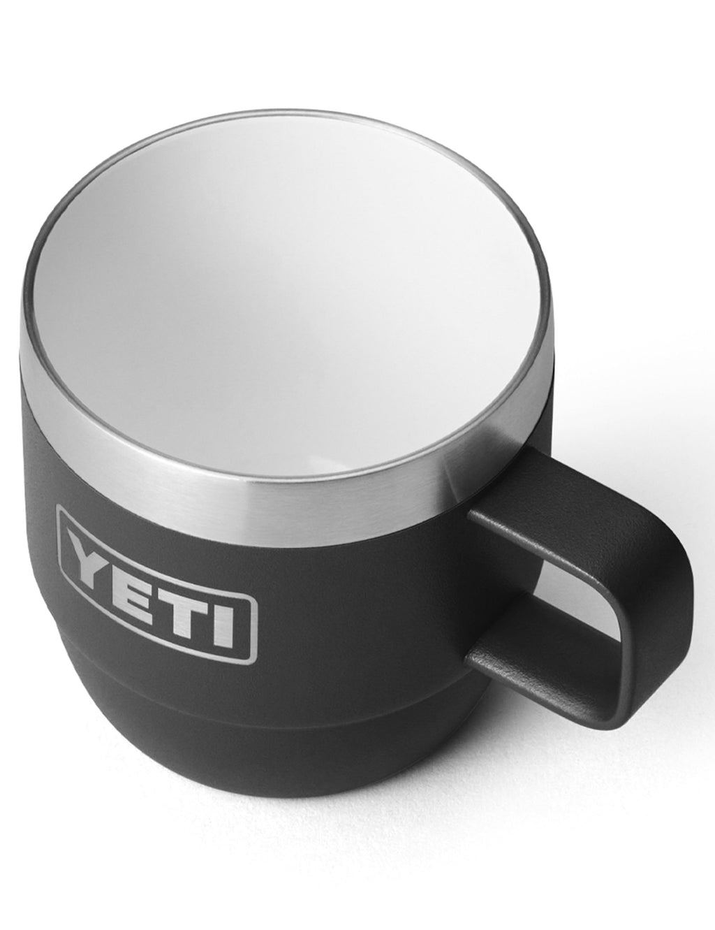 Black espresso mug with silver rim, angled handle, and YETI logo on cup
