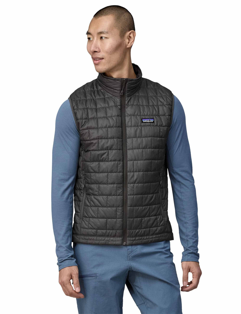 Nano Puff vest in dark gray, full-zip front with stand collar and chest logo patch