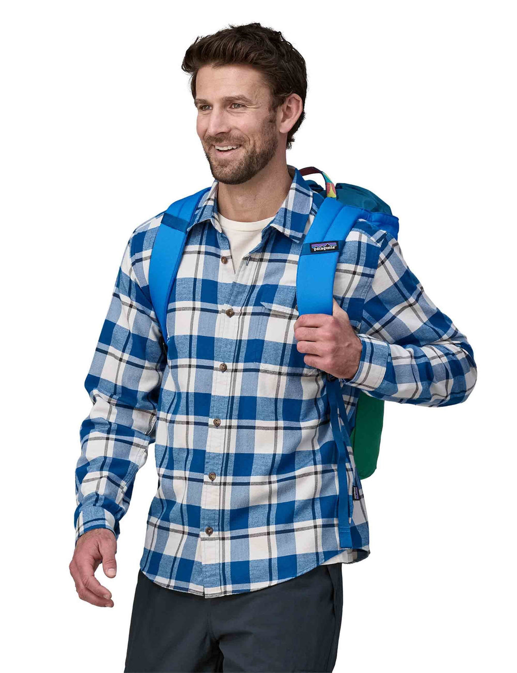 Linked backpack with blue frame and green body, worn over a plaid shirt